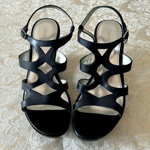 Designer, Calvin Klein wedge heel sandals. Unique style. Worn once indoors. Sz9